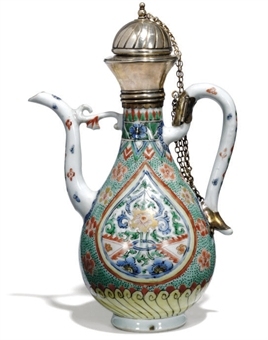 A CHINESE FAMILLE VERTE SILVER MOUNTED EWER
