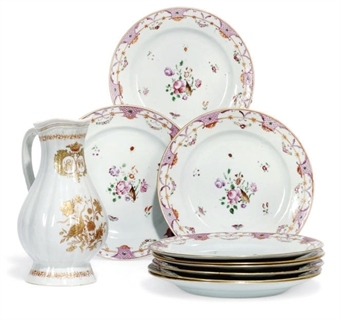 A CHINESE MONOGRAMMED EWER AND NINE FAMILLE ROSE EXPORT DISHES