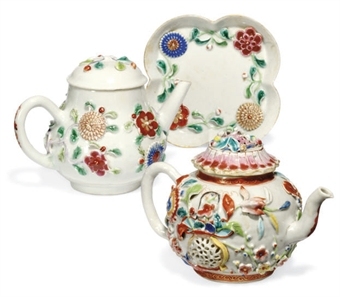 TWO CHINESE FAMILLE ROSE MOULDED TEAPOTS AND COVERS