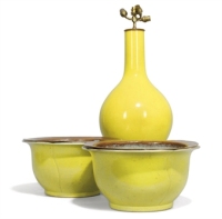 A PAIR OF CHINESE YELLOW GLAZED JARDINIERES