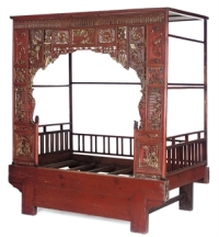 A CHINESE PARCEL GILT AND PAINTED OPIUM BED