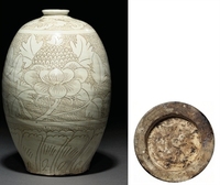 A RARE CIZHOU SGRAFFIATO WHITE-GLAZED OVOID VASE