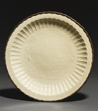 A VERY RARE MOULDED DINGYAO DISH