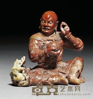 17TH/18TH CENTURY A SOAPSTONE FIGURE OF A SEATED LUOHAN 