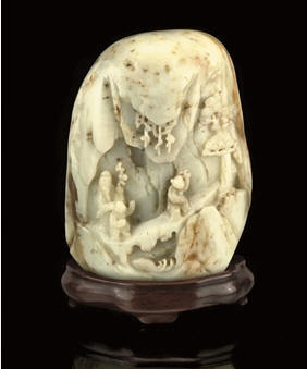 A GREY CELADON AND RUSSET JADE MOUNTAIN GROUP, 19TH CENTURY
