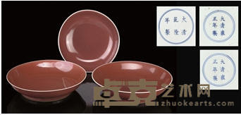 THREE LIVER-RED-GLAZED DISHES, YONGZHENG AND QIANLONG MARKS AND OF THE PERIOD (1723-35 AND 1736-95) 20.5 cm