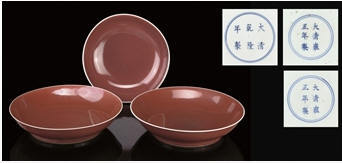 THREE LIVER-RED-GLAZED DISHES, YONGZHENG AND QIANLONG MARKS AND OF THE PERIOD (1723-35 AND 1736-95)