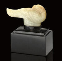 A PALE CELADON AND RUSSET JADE BIRD FORMED FINIAL, SONG/MING DYNASTY