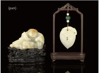A PALE CELADON JADE PENDANT, 19TH CENTURY