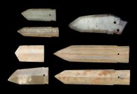 A GROUP OF SEVEN JADE BLADES，SHANG DYNASTY (1600-1100BC) AND LATER