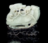 A PALE CELADON JADE MODEL OF A DUCK，QIANLONG (1736-1795)