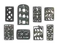 A GROUP OF EIGHT BRONZE RECTANGULAR FITTINGS，HAN DYNASTY (206 BC-AD 220) AND LATER