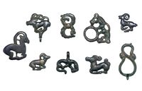 A GROUP OF NINE BRONZE FIGURAL FITTINGS，HAN DYNASTY (206 BC-AD 220) AND LATER