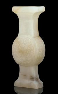 A PALE CELADON JADE GU VASE，18TH CENTURY