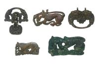 A GROUP OF FIVE BRONZE FIGURAL FITTINGS