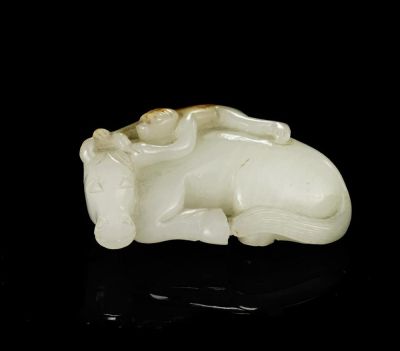 19TH CENTURY A SMALL WHITE AND RUSSET JADE CARVING OF A MONKEY AND HORSE