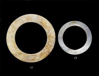 NEOLITHIC PERIOD A BEIGE JADE DISC