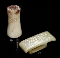 ZHOU DYNASTY A WHITE AND RUSSET JADE ORNAMENT