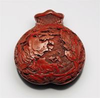 18TH CENTURY A SMALL CARVED CINNABAR LACQUER POMEGRANATE-FORM BOX AND COVER