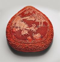 QIANLONG PERIOD A FINELY CARVED CINNABAR LACQUER PEACH-FORM BOX AND COVER