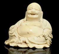 19TH CENTURY AN IVORY MODEL OF BUDAI