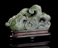 19TH CENTURY A SPINACH JADE LION FISH