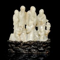 18TH CENTURY A CELADON JADE FIGURAL GROUP