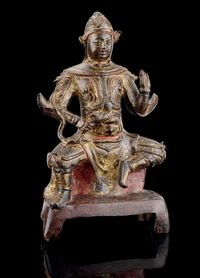 MING DYNASTY A BRONZE MODEL OF VIRAPAKSA