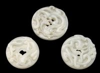 18TH CENTURY THREE PALE CELADON JADE BI-DISCS