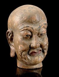 MING DYNASTY A PAINTED WOOD HEAD OF A LUOHAN