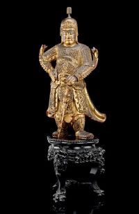 17TH CENTURY A LARGE GILT LACQUERED WOOD FIGURE OF AN IMMORTAL