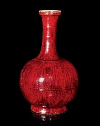 18TH CENTURY A SANG DE BOEUF BOTTLE VASE